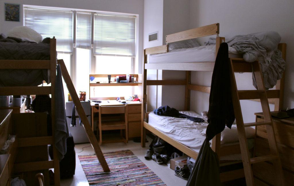 Cameron Youngblood's '25 forced-triple with bunk beds on the top floor of Rathje Hall. Photo by Maddi Shinall.