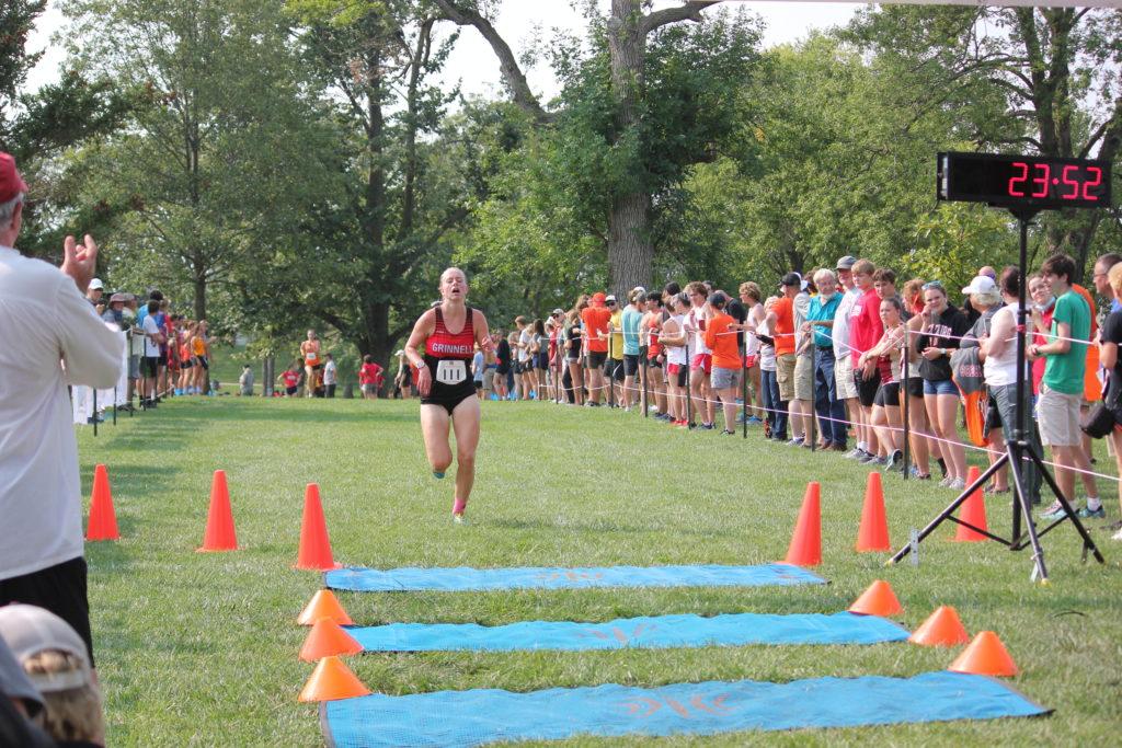 Emma Schaefer '23 dashes across the finish line just under 24 minutes. Contributed by Ted Schultz.