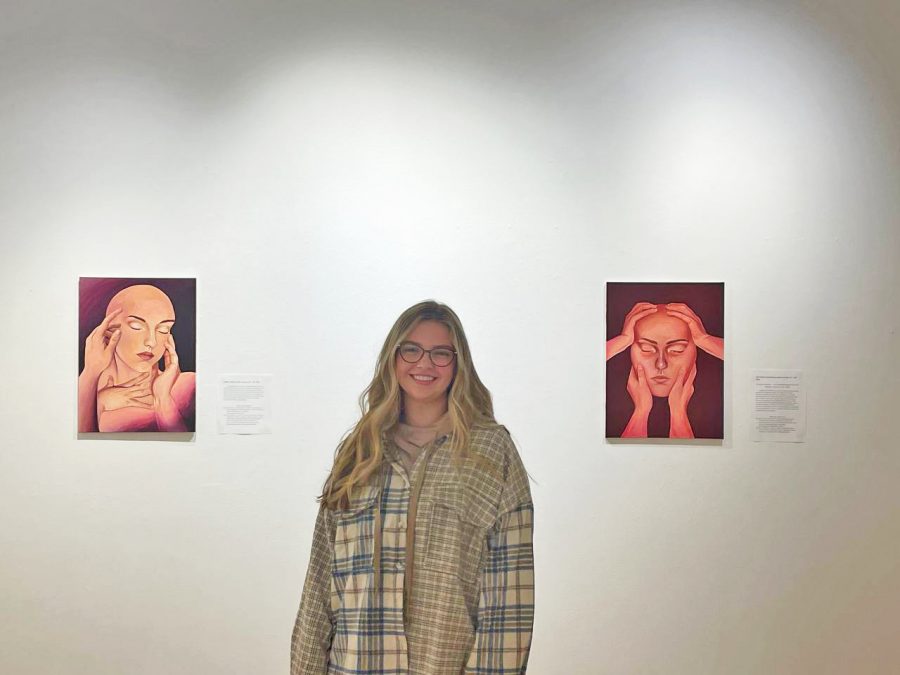 Aubrie Torhorst `23 stands between her pieces "A Body Touched" (left) and "One Needs to be Embraced" (right).