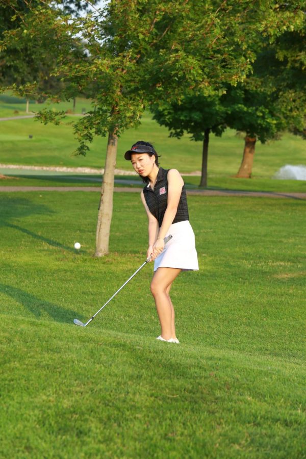 Mary Li `25 competes for the women’s golf team. Li was named the SLIAC player of the week for Sept. 21.