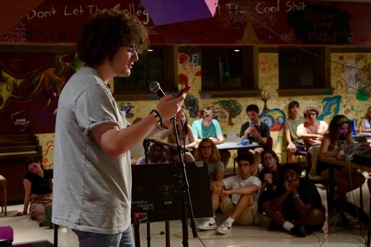 Audience members crowd in to hear original poetry at Bob's open mic.