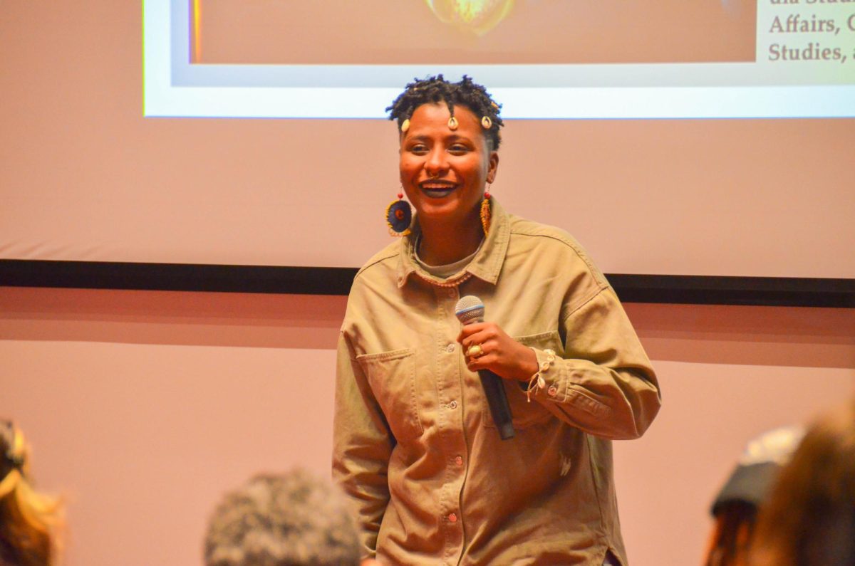 Ana María Jessie Serna smiles while answering questions about their work as a filmmaker.