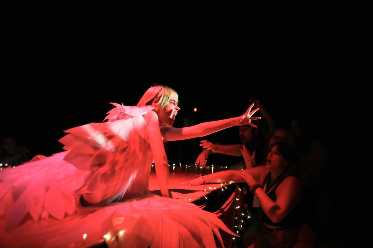 The Merciful Marilyn Michael reaches towards her adoring fans.