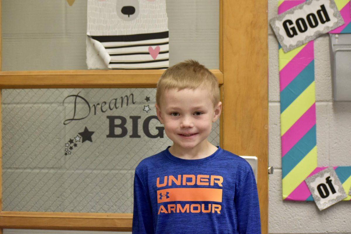 Noah, a first-grader, plays basketball at Bailey Elementary. 